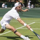 Leandro Riedi a signé une deuxième victoire sur le gazon londonien. KEYSTONE/ALESSANDRO DELLA VALLE